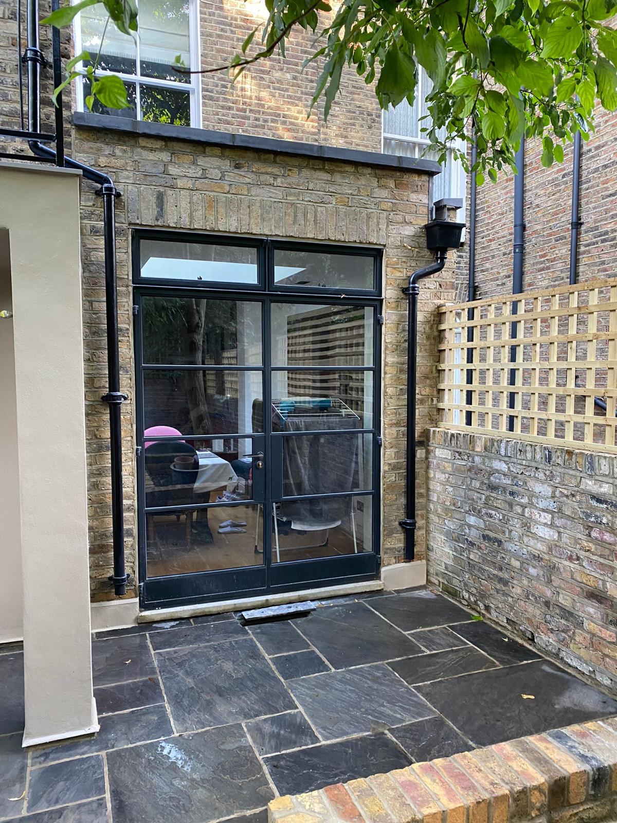 Well-finished rear house exterior and terrace on a London property